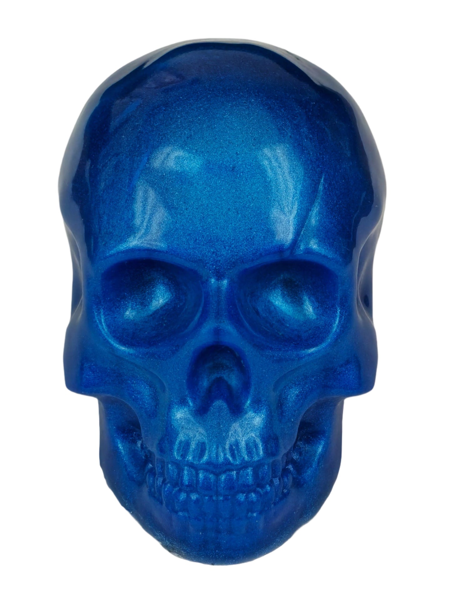 A blue epoxy skull sculpture with a pearlized effect. Front