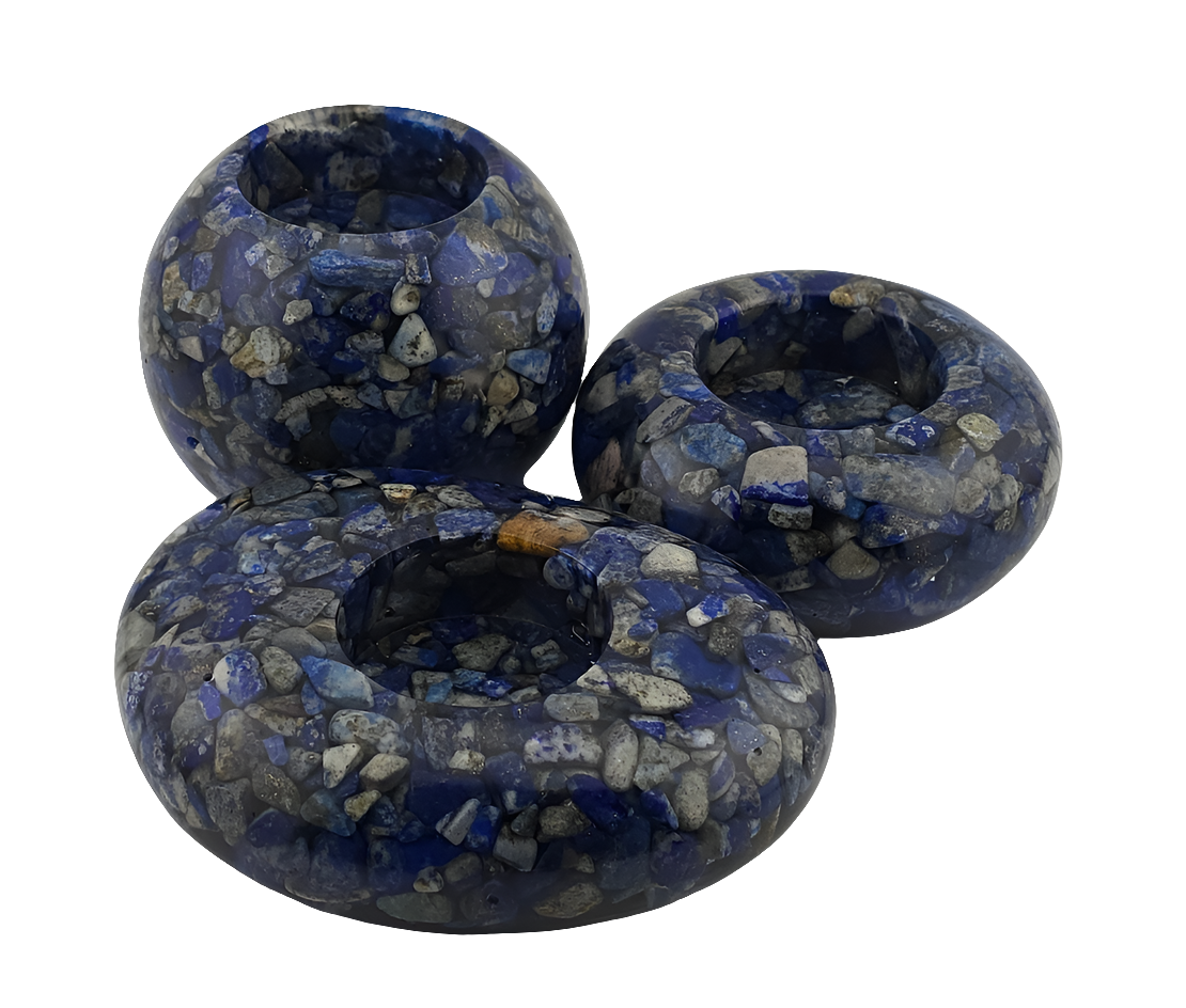 Three blue Lapis Lazuli tea light candle holders on a white background