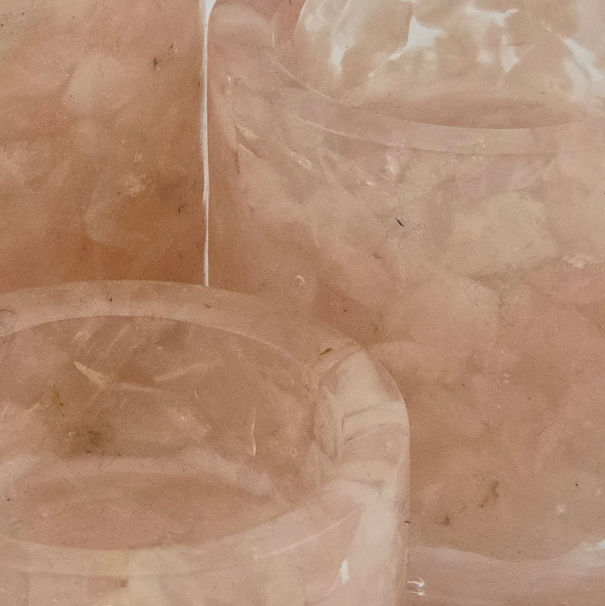 Close-up of Rose Quartz gemstone tea light candle holders.