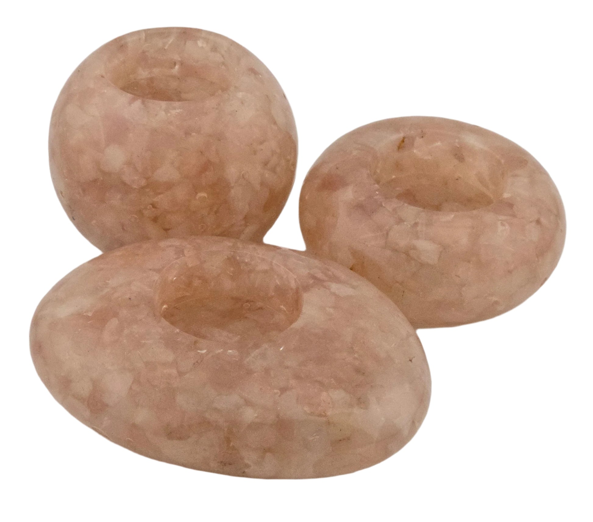 Three brown stone candle holders on a white background