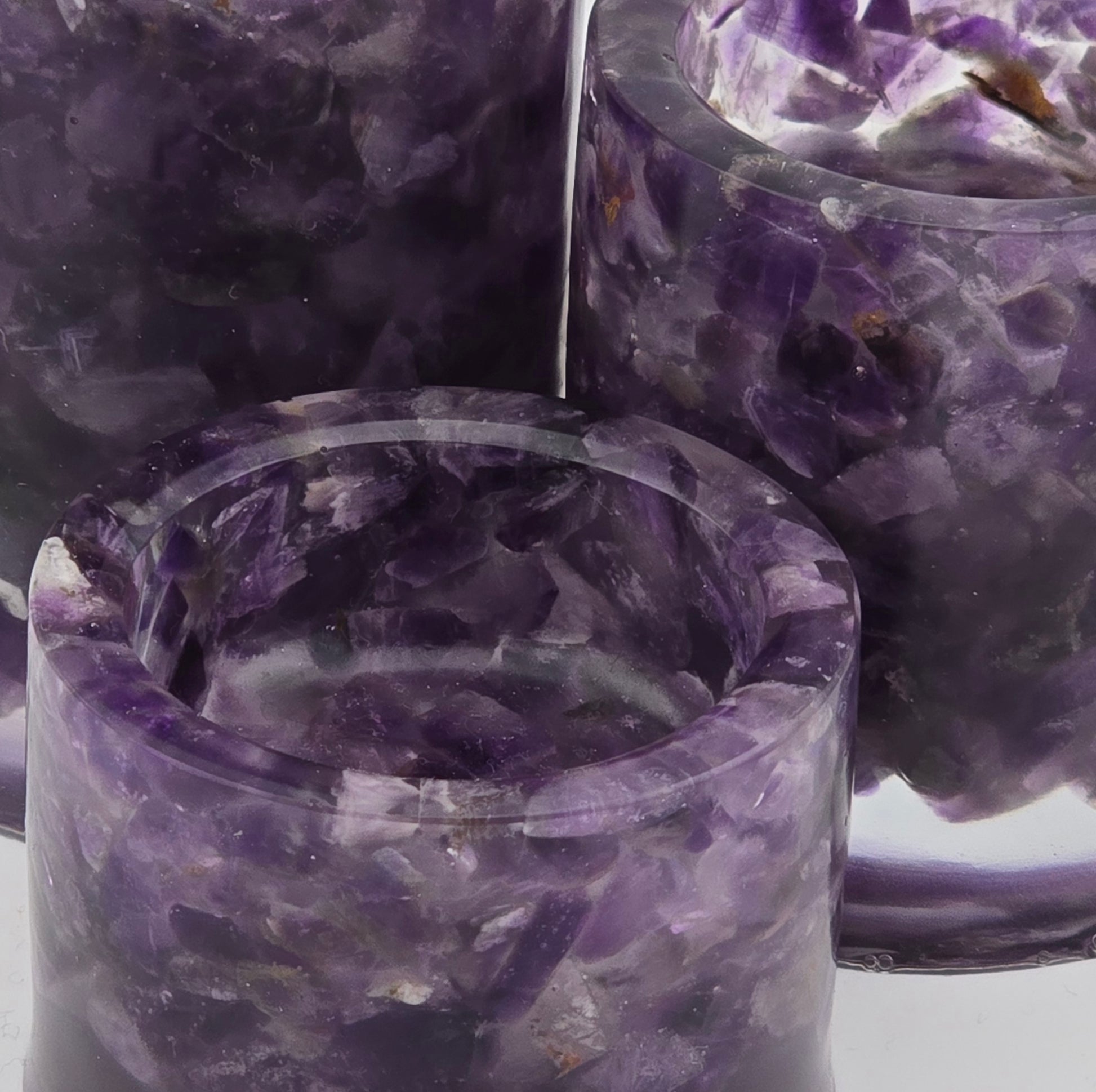 Close-up of purple Amethyst crystal tea light candle holders close-up