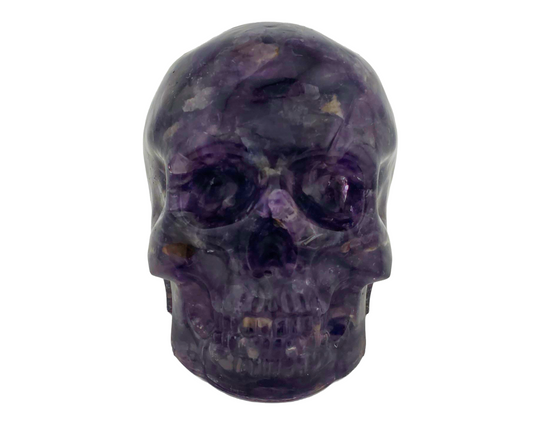 Amethyst and epoxy resin skull on a white background
